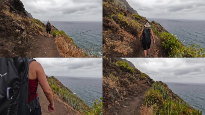 一名妇女在特内里费岛的海岸风景中徒步旅行