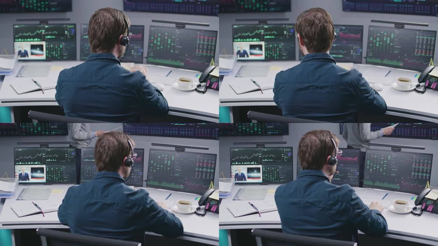 男性交易员在电脑上处理交易市场图表