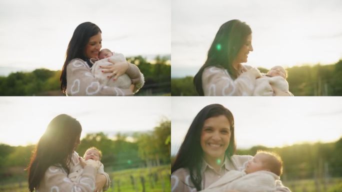慢镜头:慈爱的母亲抱着裹着毯子的可爱婴儿