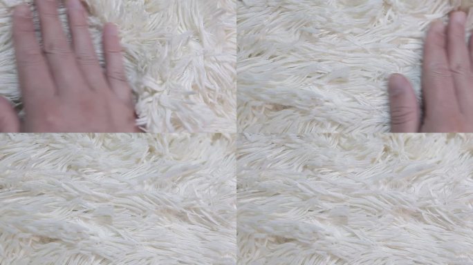 视频的手白色羊毛格纹背景