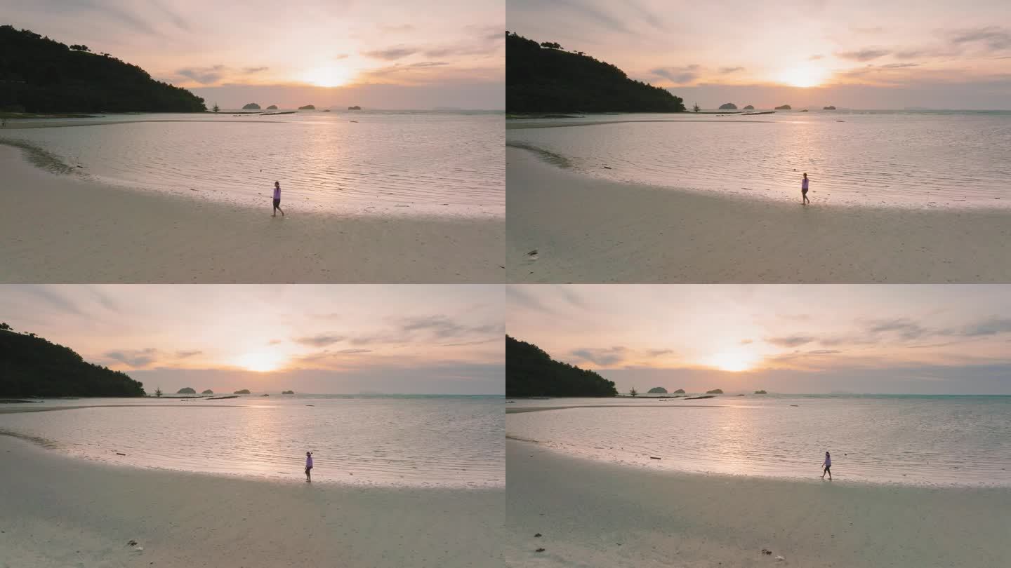 Lonely Woman  walking at the beach