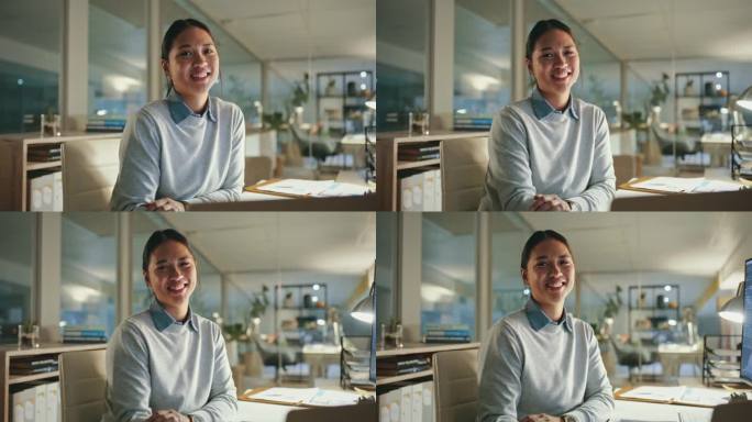 网页设计，女人的微笑和脸在晚上的办公室工作项目的最后期限。编程，加班和亚洲女性开发人员在一个网站上编