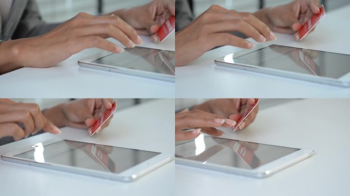 在电子商务应用中，近距离用手在平板电脑上打字确认付款。