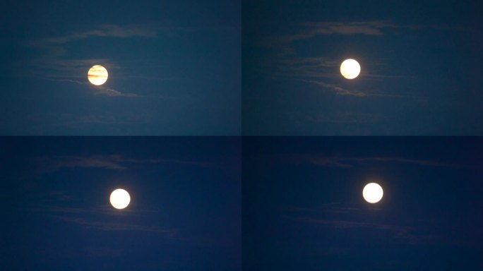 月亮上升。月亮上升。白色的月亮划过蓝天。月光。白月亮划过蓝天。每月从云层后面出来的圆盘。傍晚夜暮。自