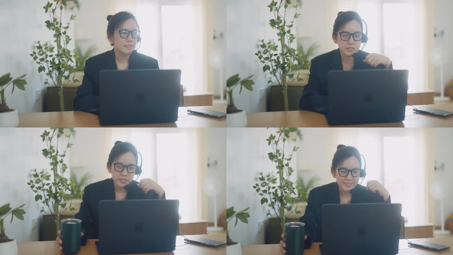 女商人在视频会议上谈论销售报告。亚洲团队使用笔记本电脑和平板电脑在线会议视频通话。在家工作、远程工作