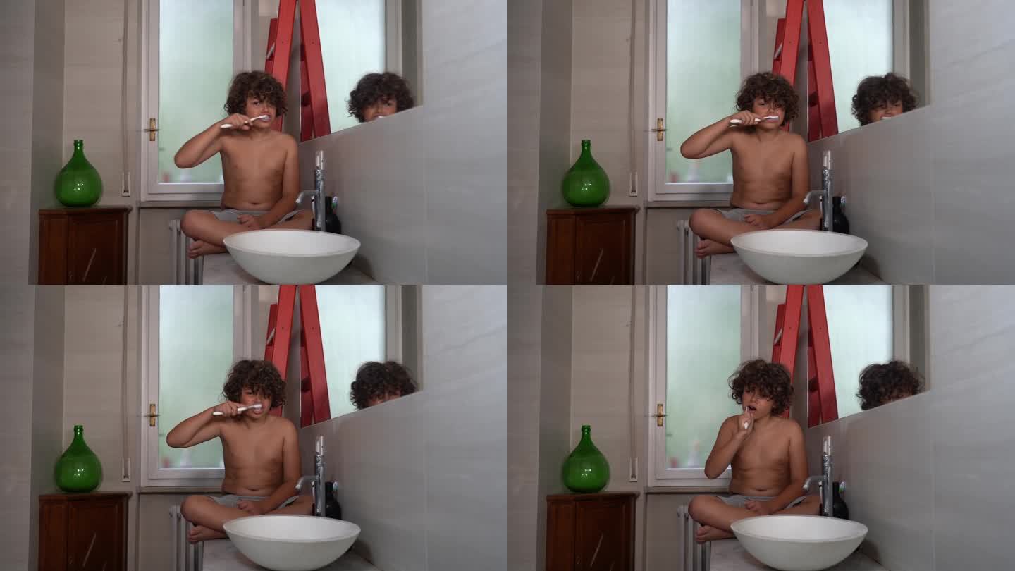 9岁小男孩在家里浴室刷牙——从小就学会注意个人卫生和身体护理