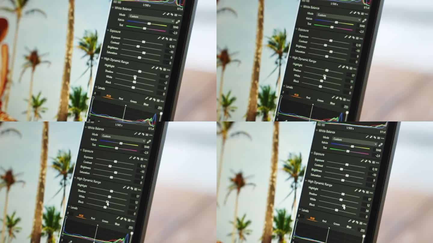 图片编辑工作与图像编辑软件。旅游摄影师编辑照片，调整曝光，白平衡与滑块。对笔记本电脑屏幕上的图片进行