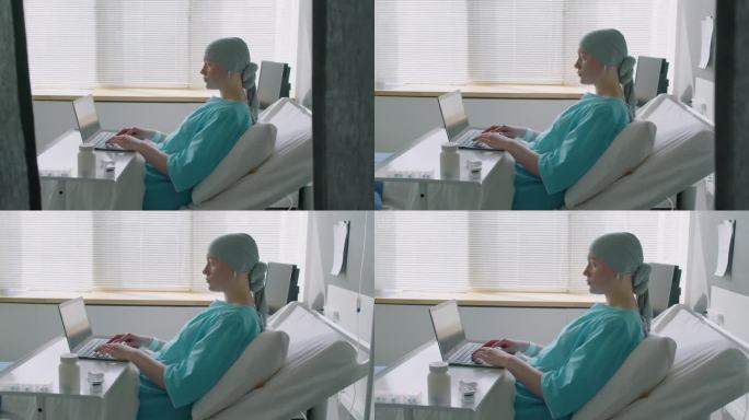 生病的女人在笔记本电脑上为她的博客打字