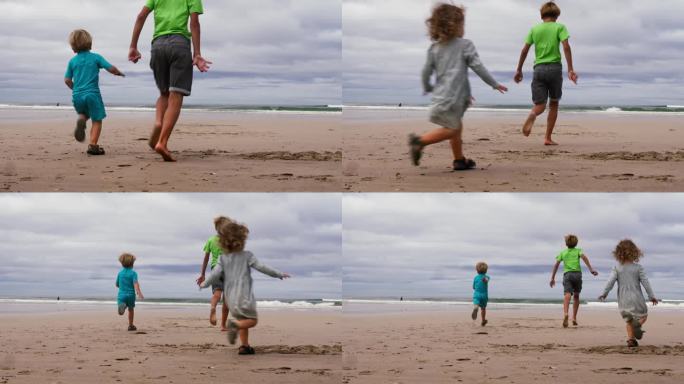 三个孩子的背影，男孩和女孩在沙滩上奔跑