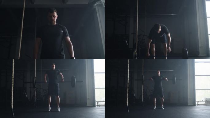 积极的举重运动员在健身房的肖像，用重物投掷杠铃