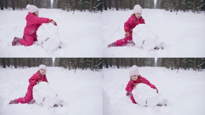 一个女孩在森林里用雪堆雪人