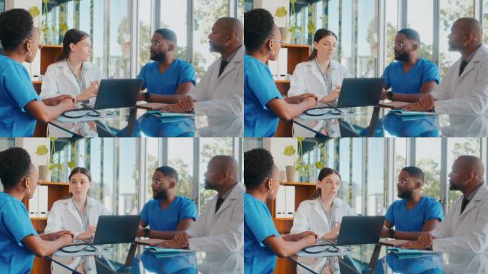 由四名白大褂医生组成的团队坐在医院的桌子旁，讨论疾病的症状，以便进一步治疗。实习生的实际工作。医学检
