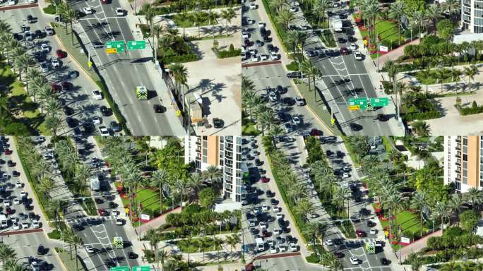 航拍的一辆救护车行驶在拥挤的街道在繁忙的交通高峰期在迈阿密市中心