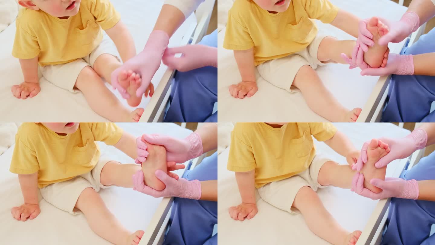医生给蹒跚学步的婴儿做体操和足底按摩。穿制服的护士正在给孩子做腿部矫形练习。2岁左右(1岁11个月)