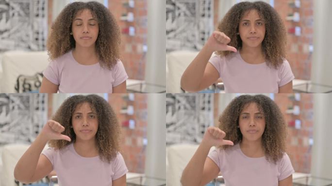 非裔美国妇女竖大拇指的肖像