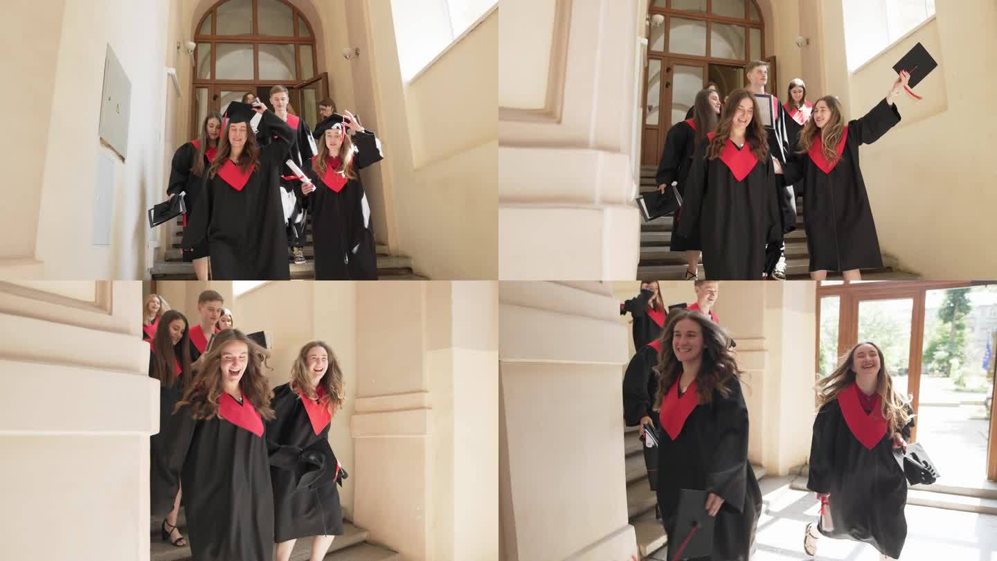 一群身着长袍的毕业生欢欢喜喜地离开大学，象征着毕业