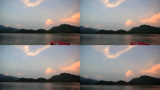 水库晚霞橙天，一个神奇的时刻，湖和山的热带景观