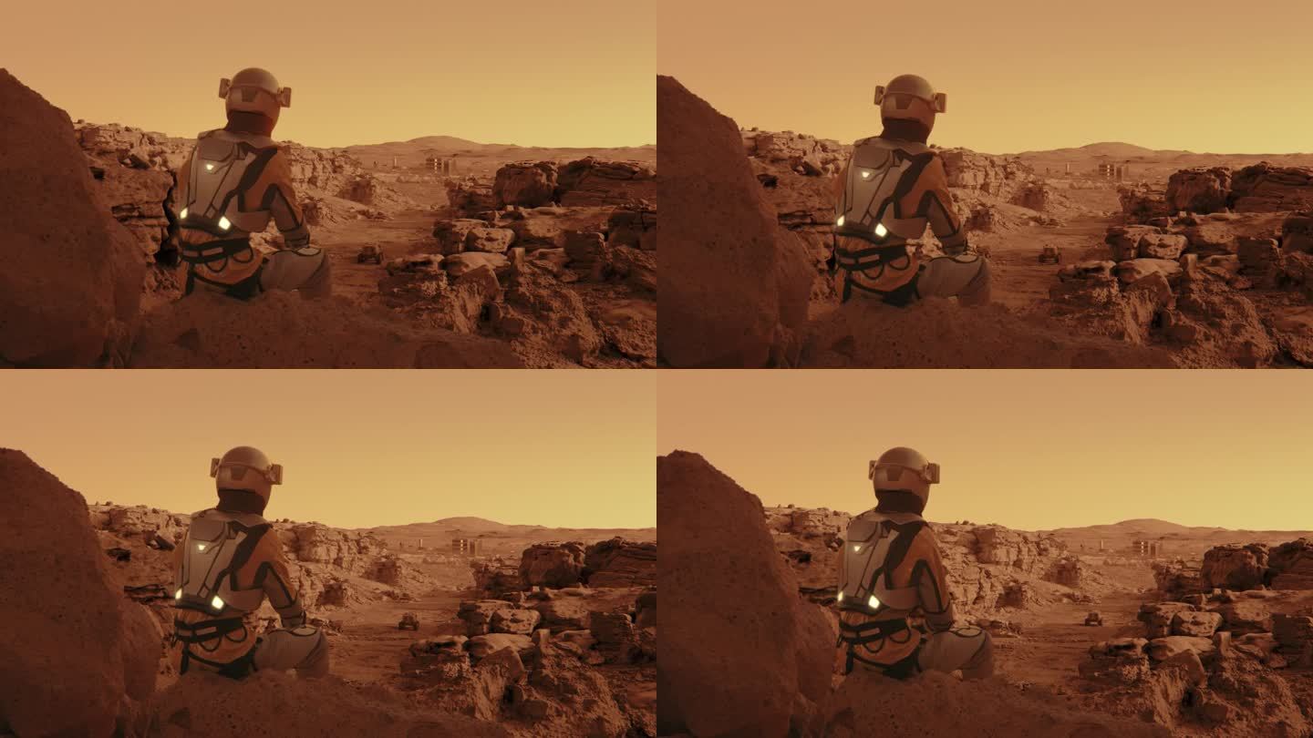 穿着防护服的宇航员。独自坐在火星表面