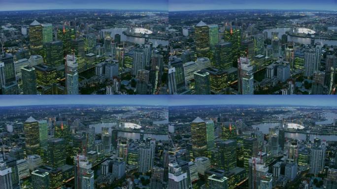 鸟瞰金丝雀码头的天际线。拥有现代摩天大楼的伦敦金融区。背景是泰晤士河。英格兰。英国。用红色武器8K拍