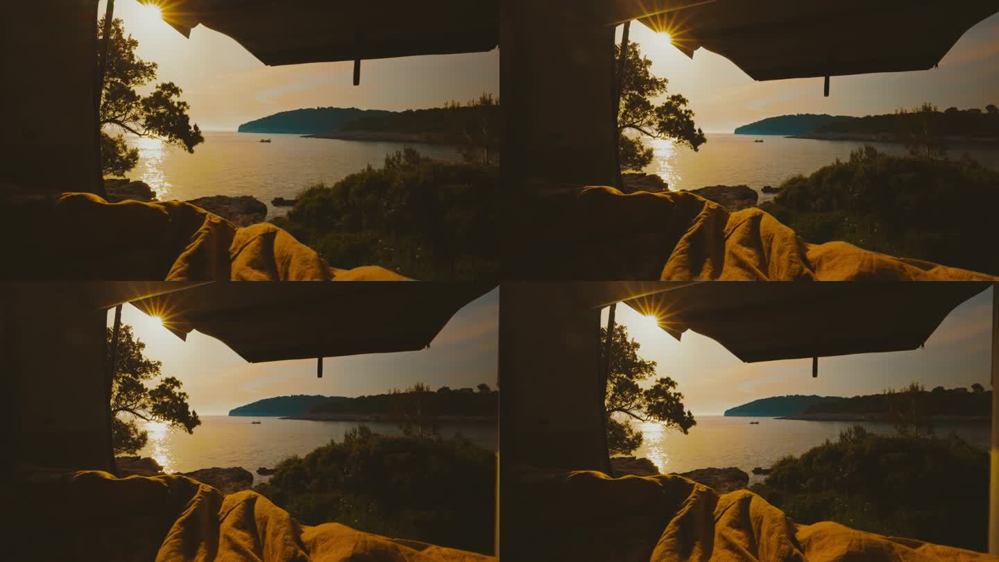 从露营车看日落时的海景