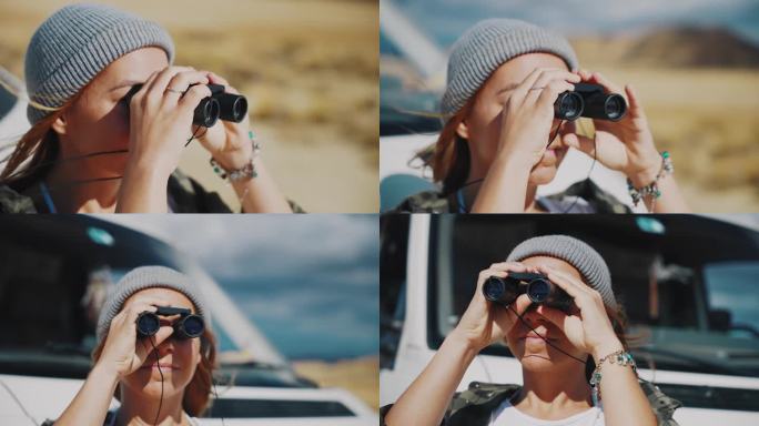 MS Woman用双筒望远镜观察摩洛哥的沙漠