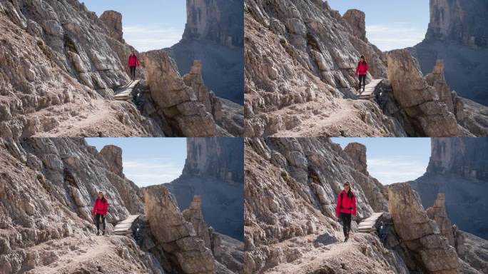 女人探索自然，在风景如画的山区徒步旅行