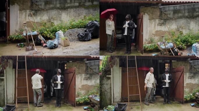 朋友们在院子打扫时躲雨