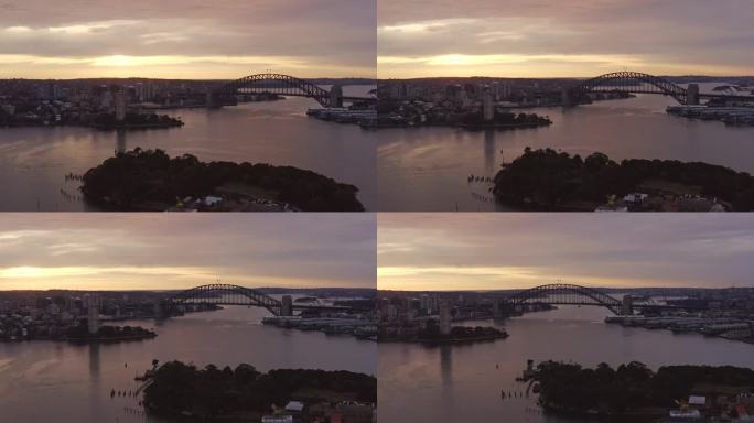 鸟瞰悉尼海港大桥在金色的冬季日出