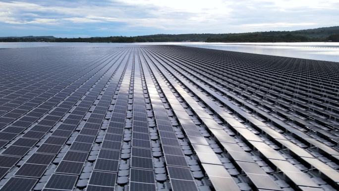 湖上发电站一排排漂浮的太阳能电池板，航拍视频