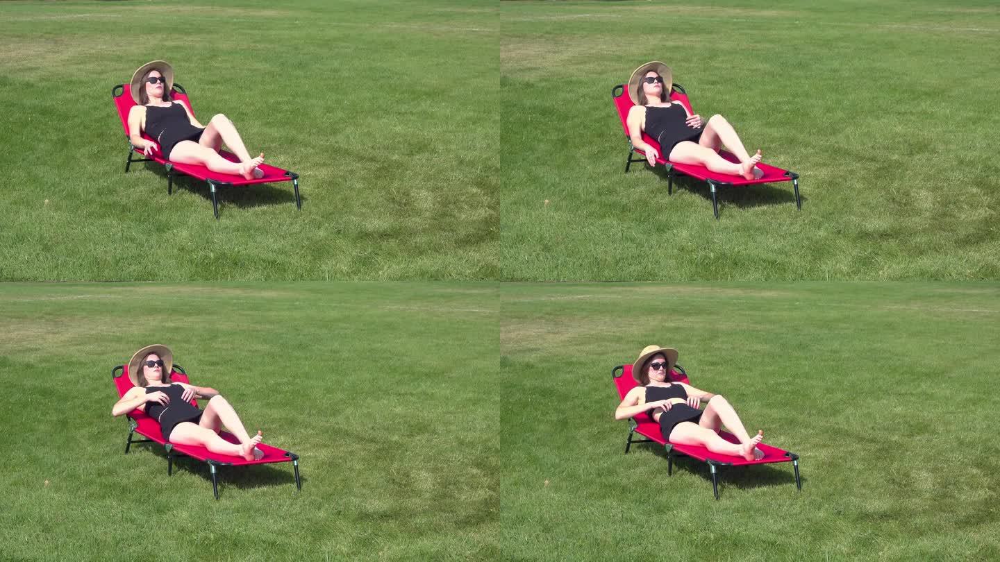 检查机器人躺在沙滩椅上视频素材度假日光浴