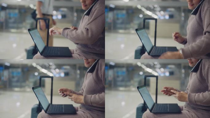 紫衣女子坐在机场候机区，打开笔记本电脑，用手机和朋友谈论旅行