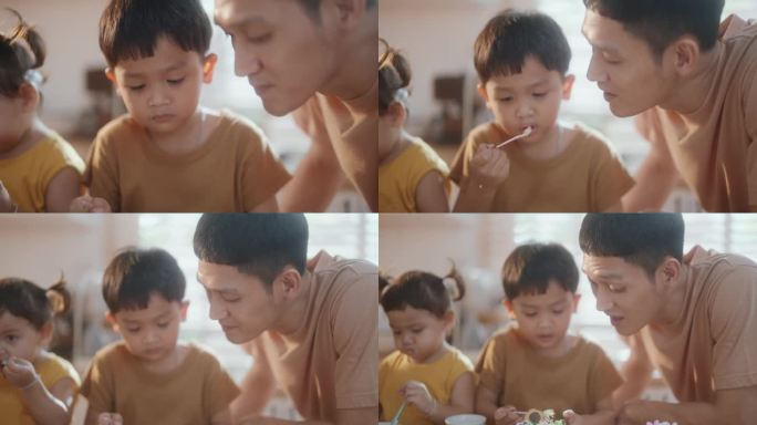 烘焙甜蜜的回忆:亚洲家庭在家里做纸杯蛋糕。快乐的亚洲家庭在家里一起烤纸杯蛋糕。