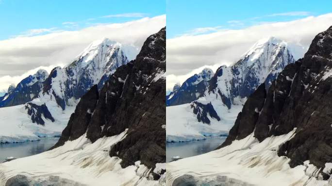 垂直拍摄南极与水和雪山在南极海洋。