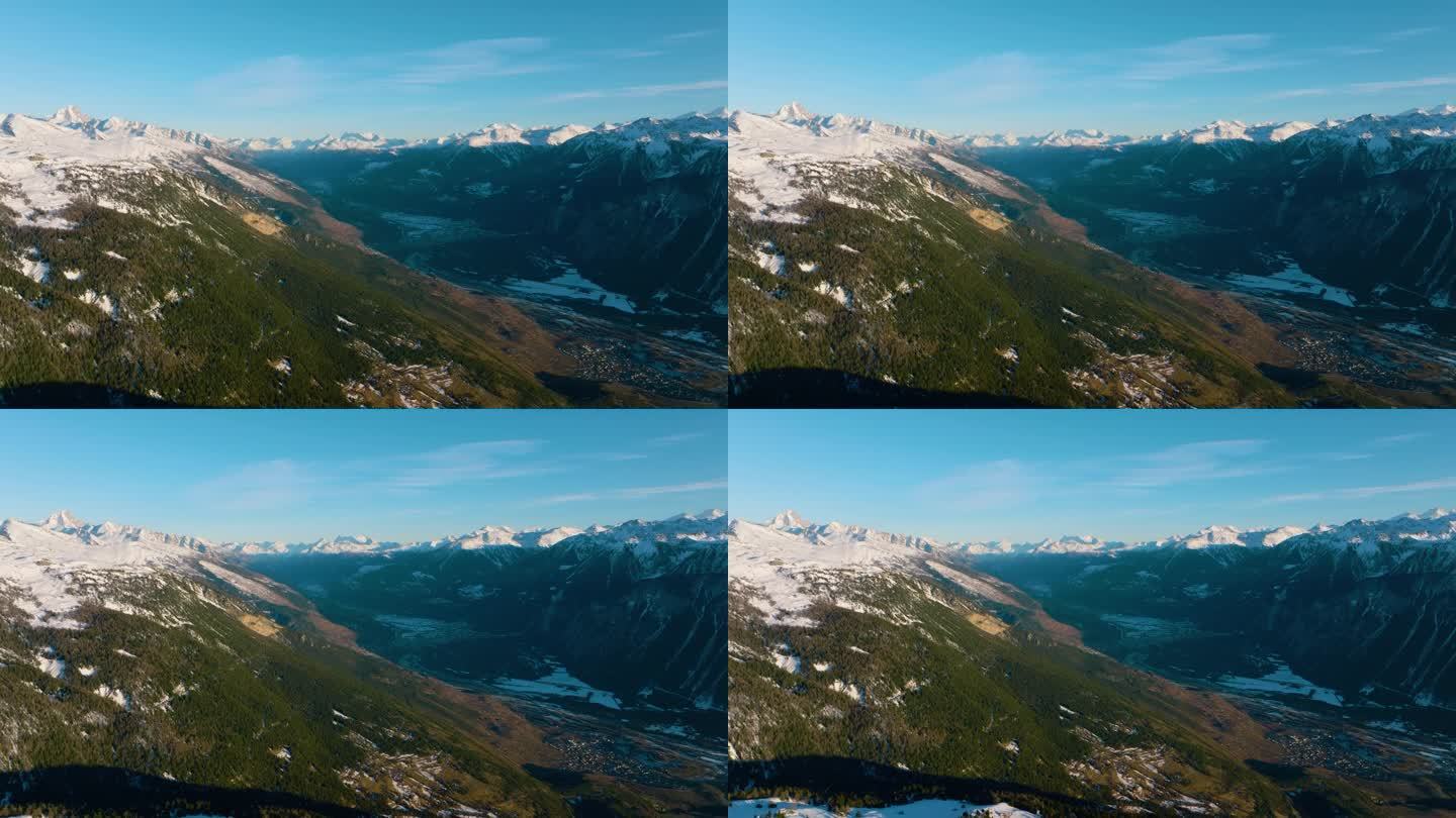 从瑞士瓦莱州的克兰斯蒙大拿滑雪胜地俯瞰上罗纳河谷的惊人景色。空中的回调