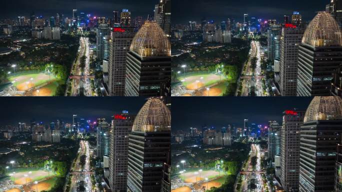 夜晚照亮雅加达市中心交通街道道路工作体育场航拍全景4k延时印尼