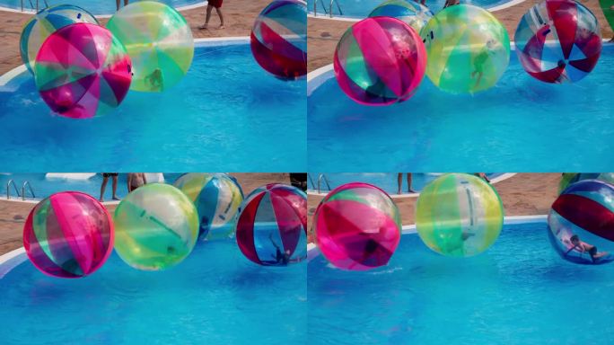 孩子们在游泳池里玩充气球