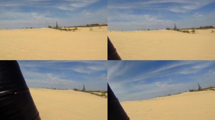 越南美奈镇的沙丘，蓝天白云为背景。