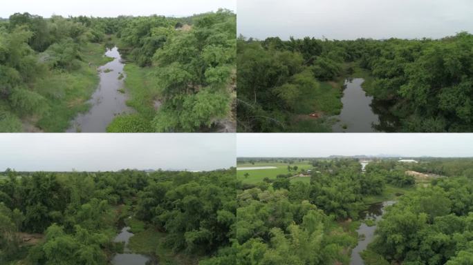 为了防止雨季的洪水，正在修建运河和大坝。日期:2021年5月14日，泰国乌泰他尼省。