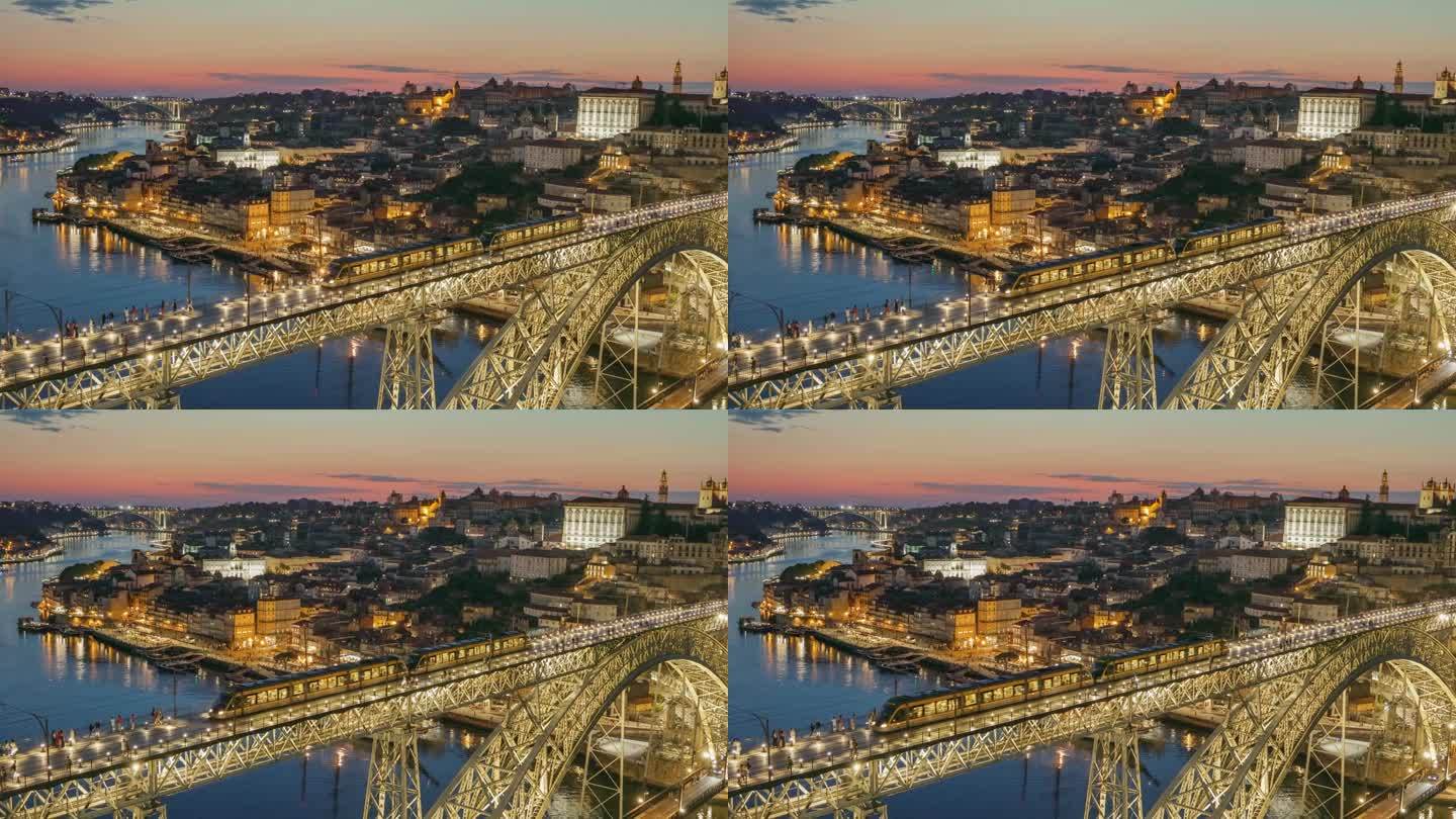 葡萄牙波尔图的日落晚景。平移拍摄波尔图老城和路易一世桥与城市灯光