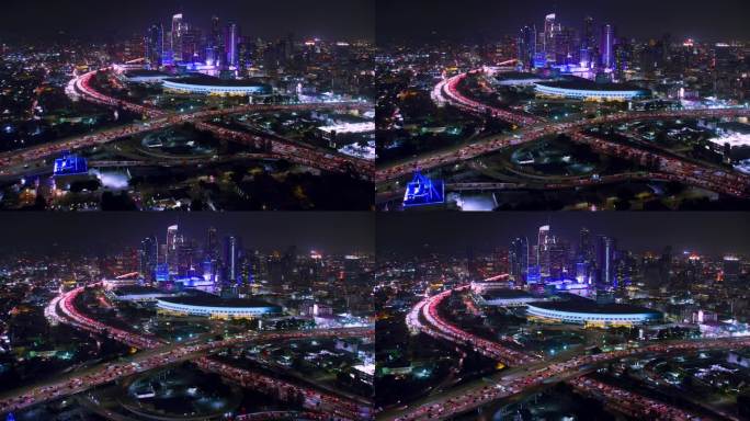 加州洛杉矶市中心金融区鸟瞰图。著名的摩天大楼和挤满汽车的高速公路。美国。的夜晚。高峰期。用红色武器8
