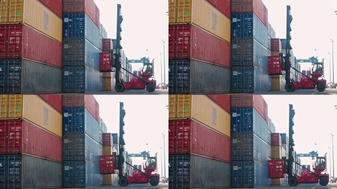 叉车卸下集装箱的4K画面。彩色集装箱堆放在港口库存视频。