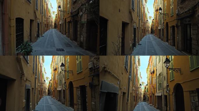 法国芒通一条狭窄街道的电影影像。