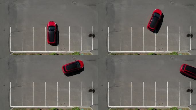 一辆红色轿车从停车场驶出，开走了，航拍画面。空荡荡的停车场。停车场有光滑的白色斑纹。车停好了，俯视图