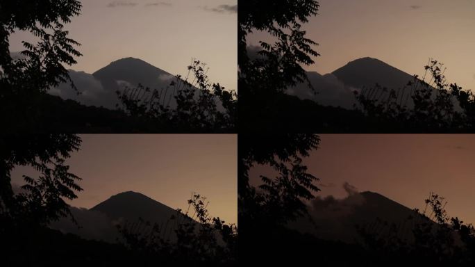巴厘岛阿贡山的日落从明亮到黑暗，延时拍摄