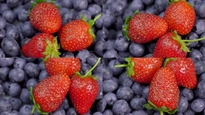 多汁的红草莓和蓝莓，俯视图。背景混合
