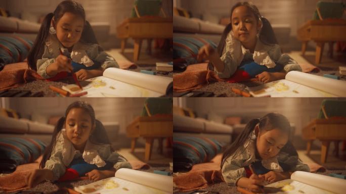 可爱小女孩躺在客厅地板上画的晚照。韩国天才儿童的创作，上色，准备成为著名的艺术家。静态的照片