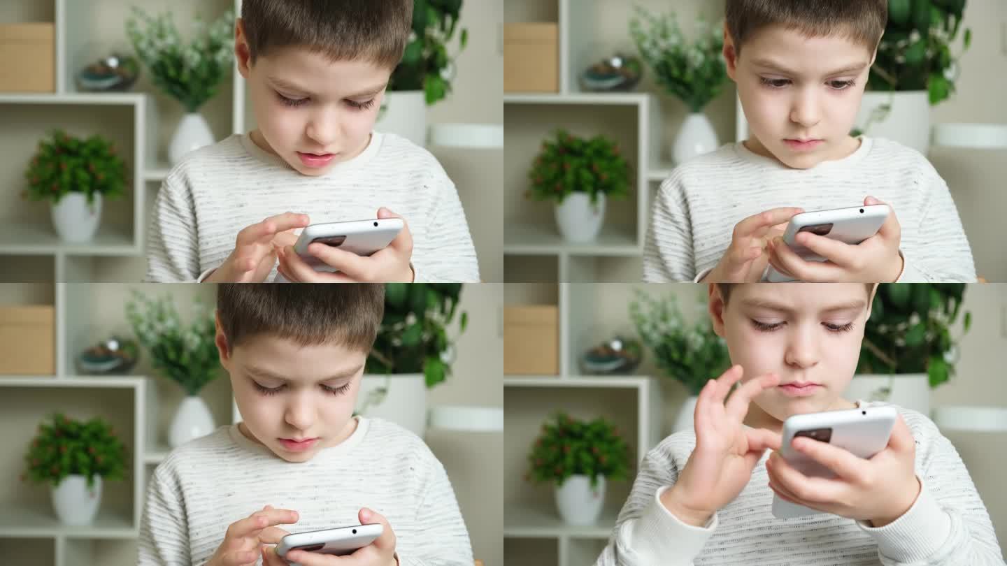 孩子使用手机，手里拿着智能手机，看着屏幕。屏幕时间，家长控制