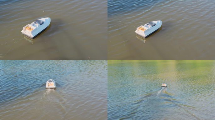 渔民在湖上用船进口鱼饵钓鲤鱼。一艘满载玉米的GPS船正在用测深仪寻找鱼类。水上的无线遥控寻鱼船携带钓