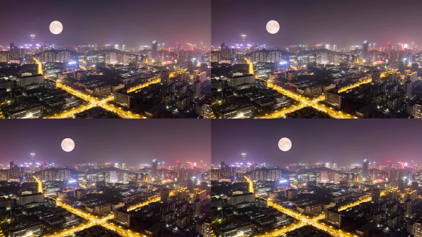 夜晚城市月亮慢慢升起圆月中秋月亮