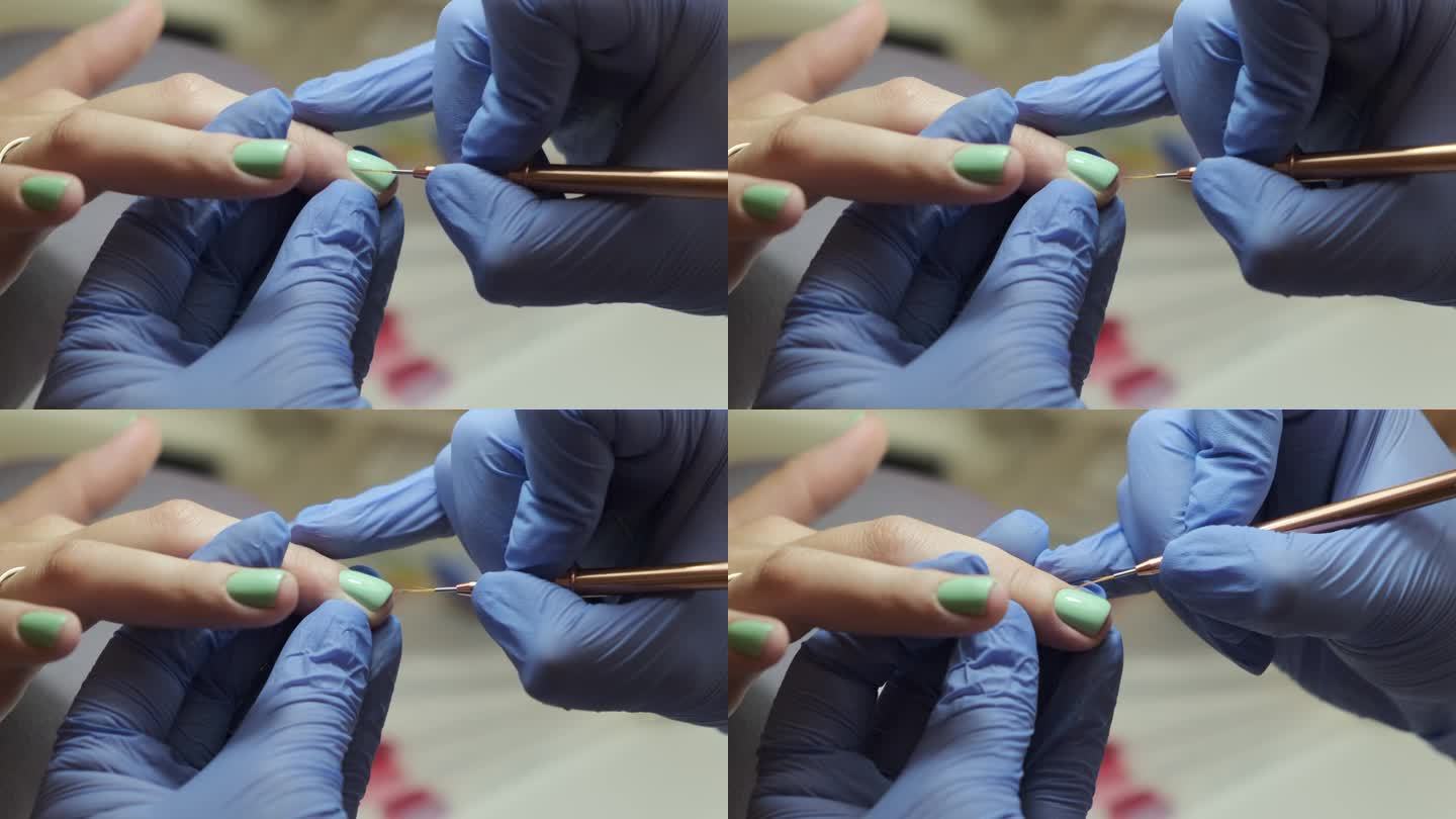 美甲师擦亮指甲。用手修指甲，指甲艺术大师用凝胶指甲油和刷子工具涂指甲，指甲护理的过程